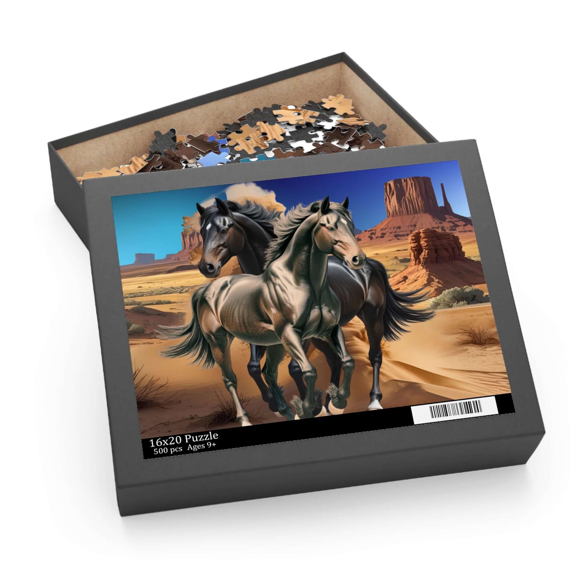 Wüstenpuzzle Wild Stallions mit zwei Pferde 500 Teile, zeigt zwei galoppierende Wildpferde in sonniger Wüstenlandschaft mit Felsen.