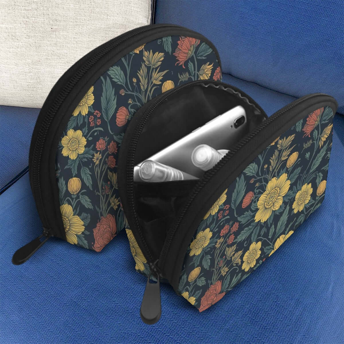 Storage Bags Set of 2, large and small sizes, floral design, made of polyester, sublimation printed, zipper closure, shown on a sofa.