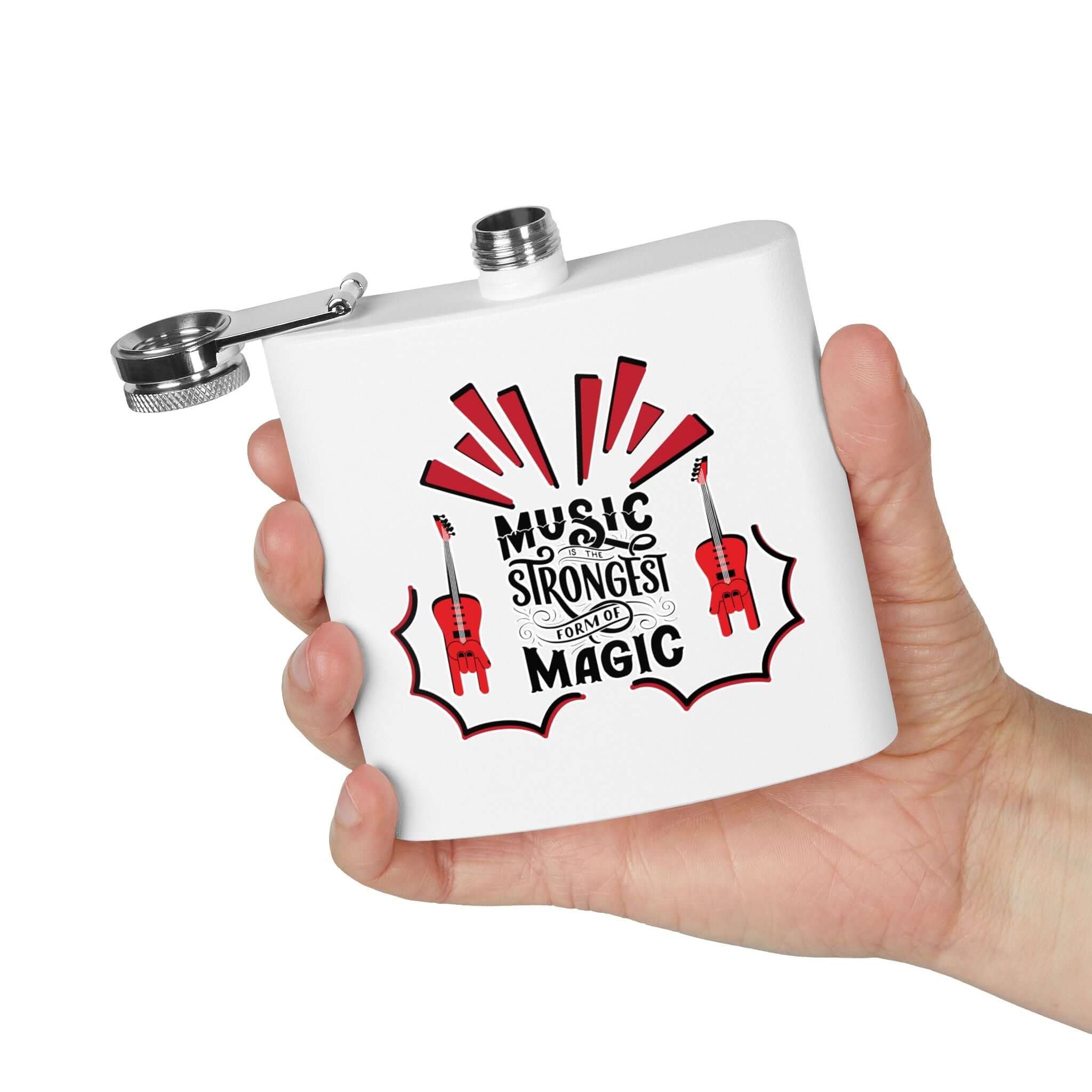 Person holding Music Magic Edelstahl-Flachmann with music-themed design, perfect gift for music lovers, 170 ml capacity.