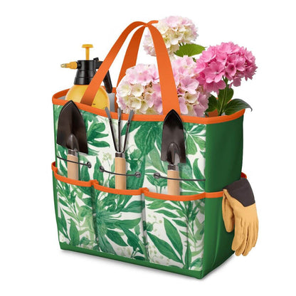 Gartengerätetasche aus Oxford-Stoff mit mehreren Taschen, bedruckt mit Pflanzenmuster, enthält Gartenschaufeln, Handschuhe und Blumen.
