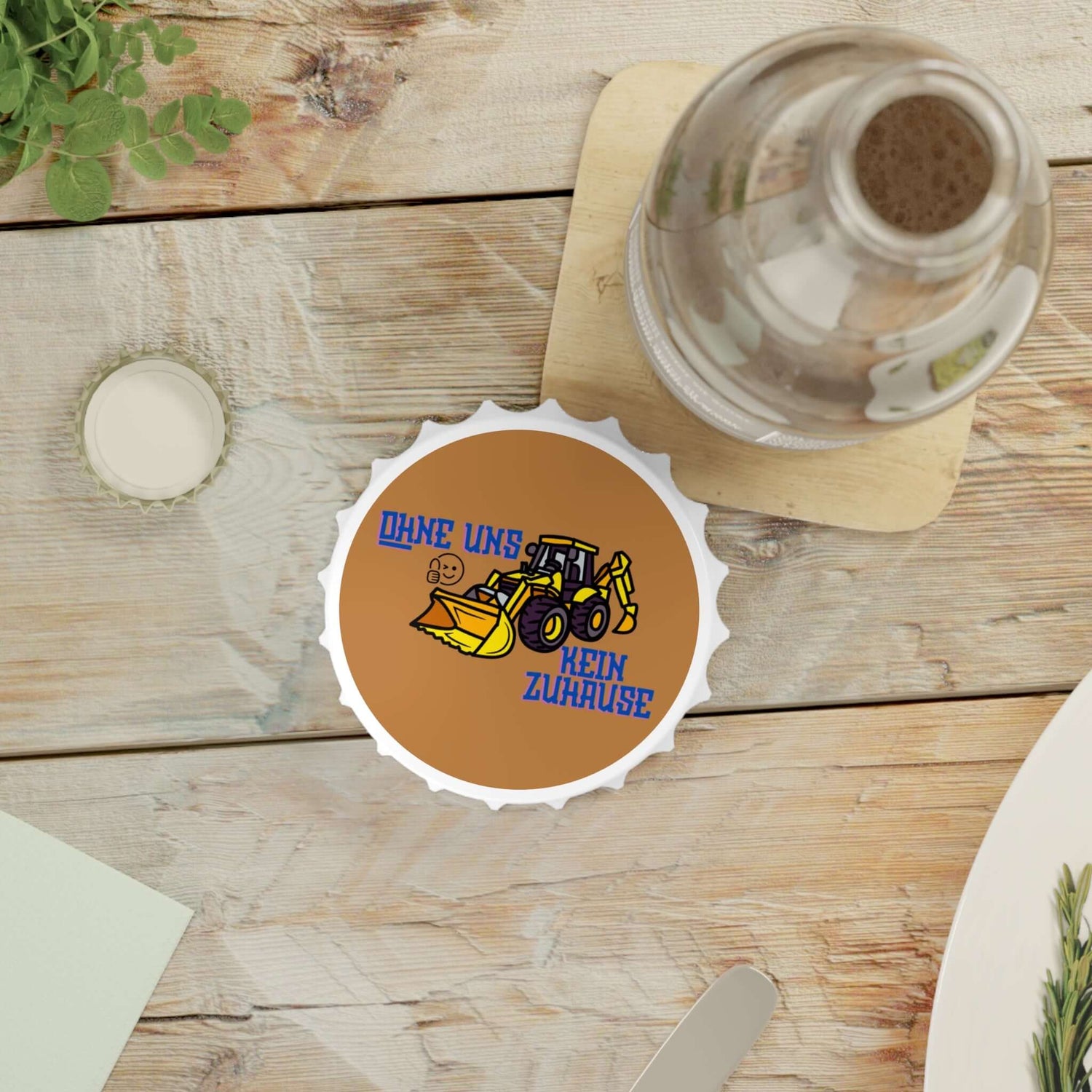 Flaschenöffner – „Ohne Uns Kein Zuhause“ (Backer-Motiv) Ein Flaschenöffner, der nicht nur praktisch ist, sondern auch eine persönliche Botschaft trägt. Mit dem Spruch „Ohne Uns Kein Zuhause“ und einem Backer-Motiv wird er zum originellen Accessoire oder G