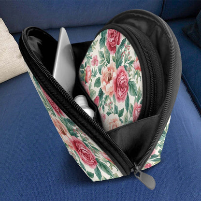 Aufbewahrungsbeutel-Set (2 Stück) in floralem Design mit sublimiertem Druck, geöffnet auf einem blauen Sofa, zeigt großen Stauraum