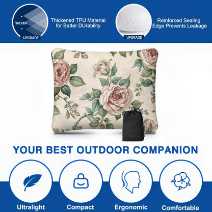 Aufblasbares Campingkissen mit floralem Design und Blasventil, ultraleicht, kompakt und ergonomisch für Outdoor-Nutzung.