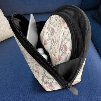 Floral polyester Aufbewahrungsbeutel-Set (2 Stück) with open zipper, large capacity, ideal for organizing on a sofa.
