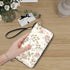 Clutch-Geldbörse für Damen - Stilvolle PU-Wallets mit Blumenmuster, elegante Handtasche aus hochwertigem PU-Stoff auf Tisch