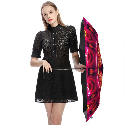 Frau hält UV-Schutz-Regenschirm mit buntem Muster, Details für UV-Schutz-Regenschirm ansehen