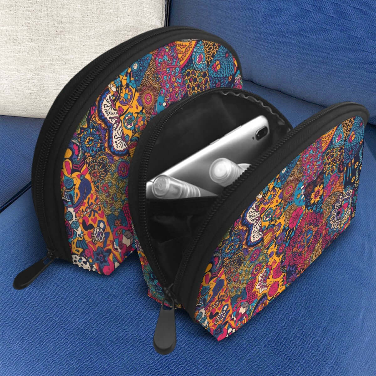 Storage Bags Set of 2 in vibrant design with compartments on a blue couch, showcasing large and small bags with zipper closure.