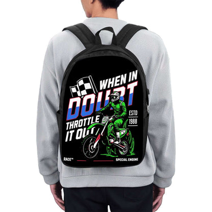 Person wearing a black backpack with racing graphics and &