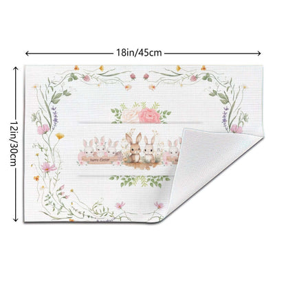 Tischset aus gewebtem PVC, 18x12 Zoll, mit einseitigem Design aus floralen Mustern und Häschen, rutschfest und hitzebeständig bis 80 °C.