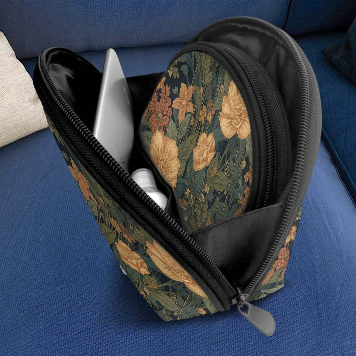 Storage Bags Set of 2 with floral design on a blue sofa, showcasing open zipper and large capacity for various items.