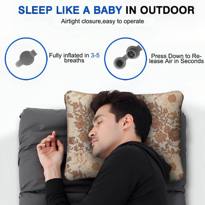 Person sleeping outdoors on a floral-patterned aufblasbares Campingkissen, showing how easy it inflates and deflates for comfort.