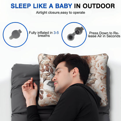 Aufblasbares Campingkissen für Outdoor-Nutzung mit floraler Musterung, ideal für komfortablen Schlaf im Freien.