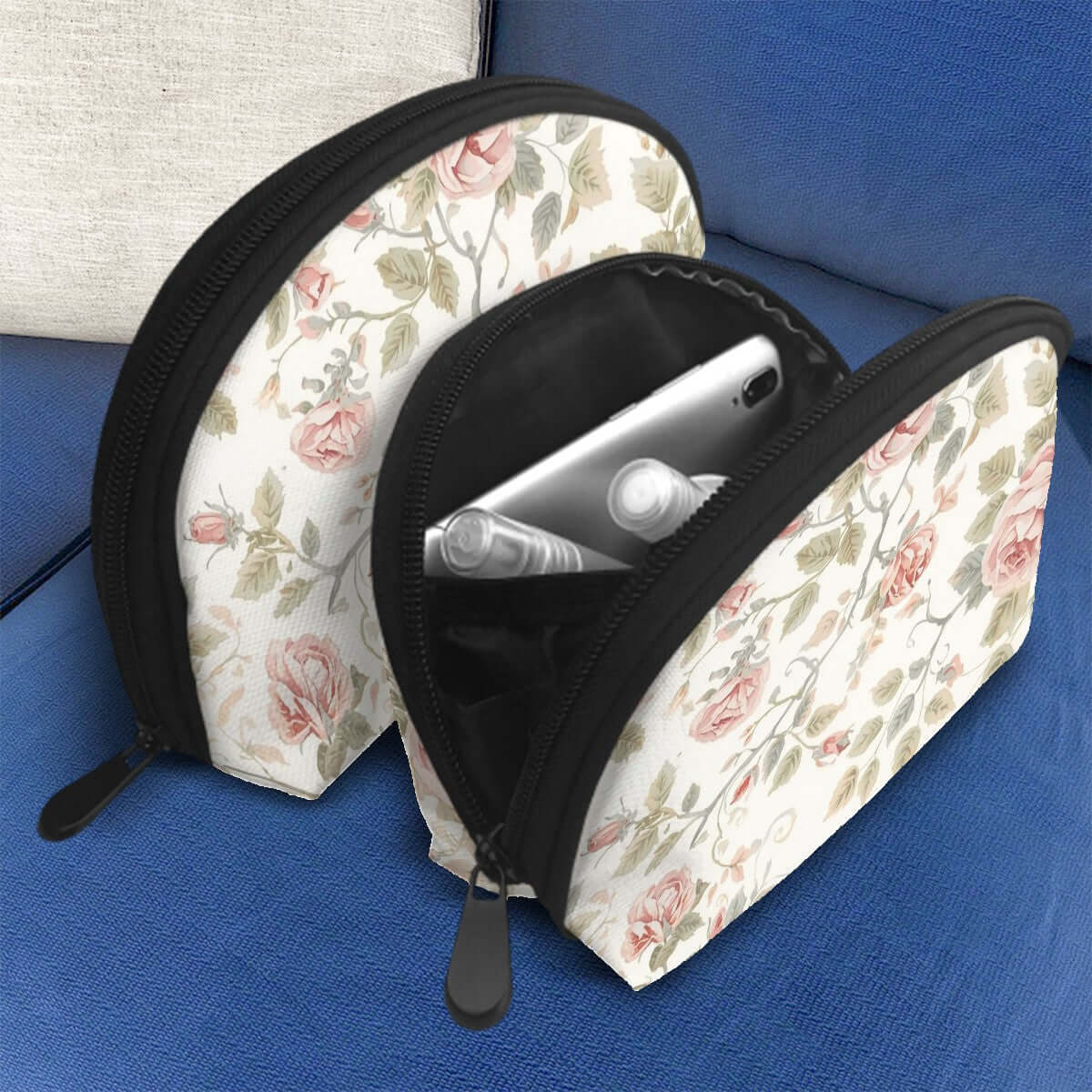 Aufbewahrungsbeutel-Set (2 Stück) aus Polyester mit floralem Design, gezeigt mit geöffnetem Reißverschluss, mobil und praktisch für den Alltag.