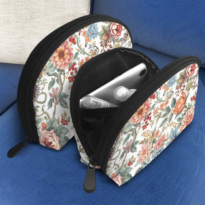 Aufbewahrungsbeutel-Set (2 Stück) aus Polyester mit floralem Design auf Sofa, große und kleine Größen mit Reißverschluss, ideal zur Aufbewahrung.