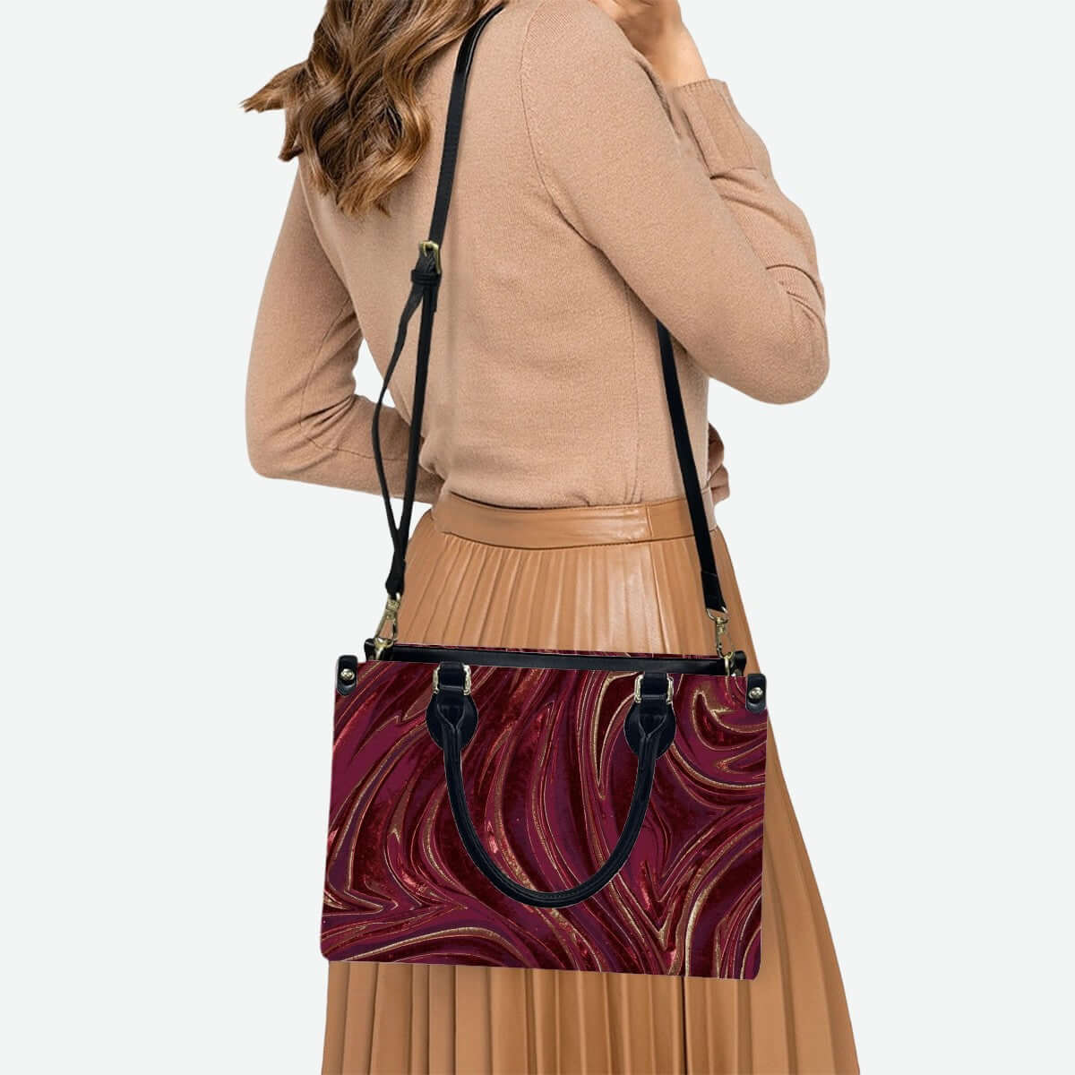 Woman holding PU Tote Bag for Women with maroon swirl pattern, black handles, showcasing UV printing design. Keywords: PU-Tragetasche für Damen.