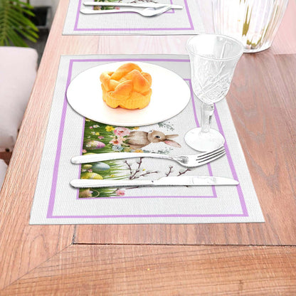 Tischset aus gewebtem PVC mit Kaninchendesign, Geschirr und Besteck auf Holztisch, hitzebeständig bis 80 °C, kratzfest, Details für Tischset aus gewebtem PVC ansehen.