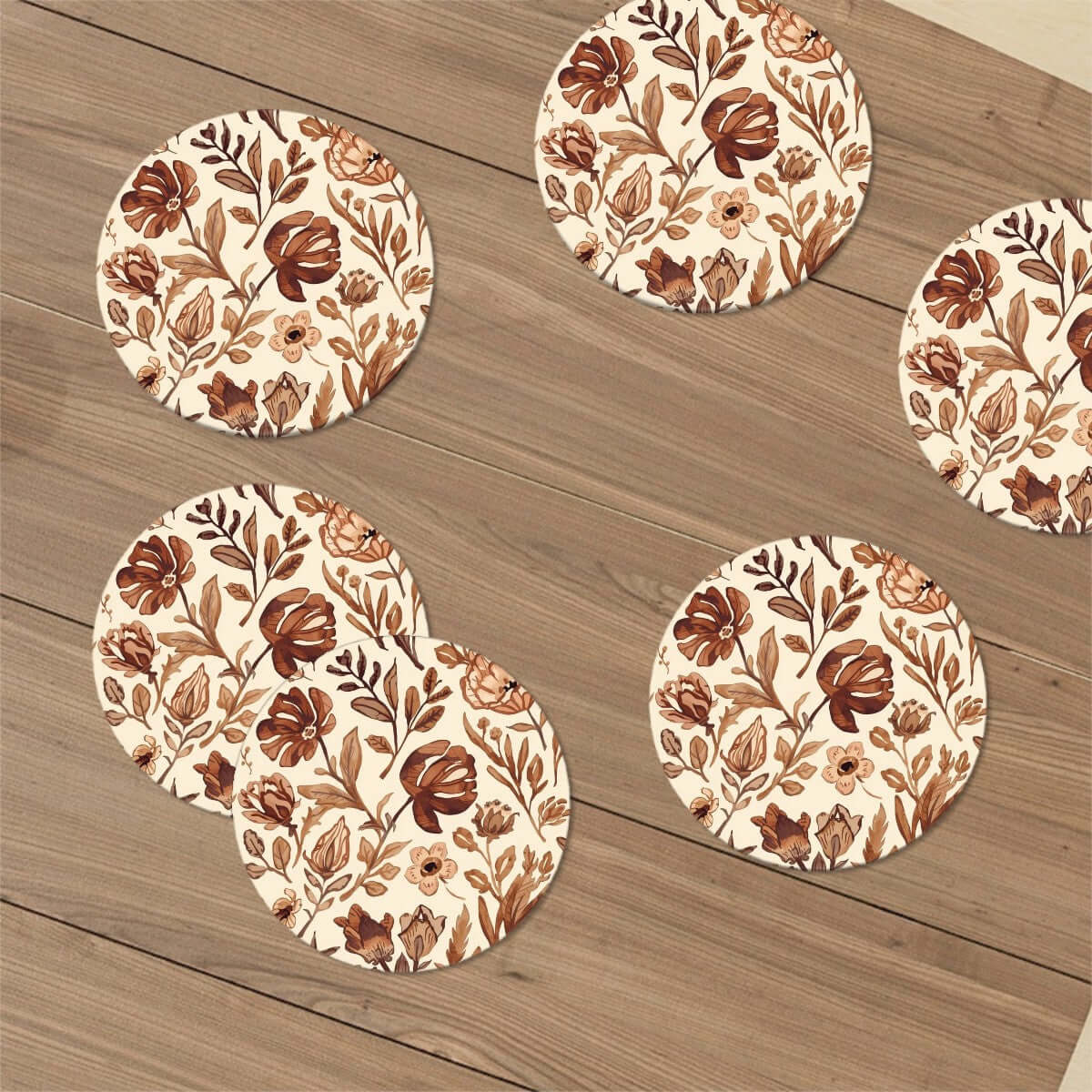 Runde Keramikuntersetzer, 6er-Set mit floralem Design auf Holztisch, perfekt für Wasserabsorption, umweltfreundlich.