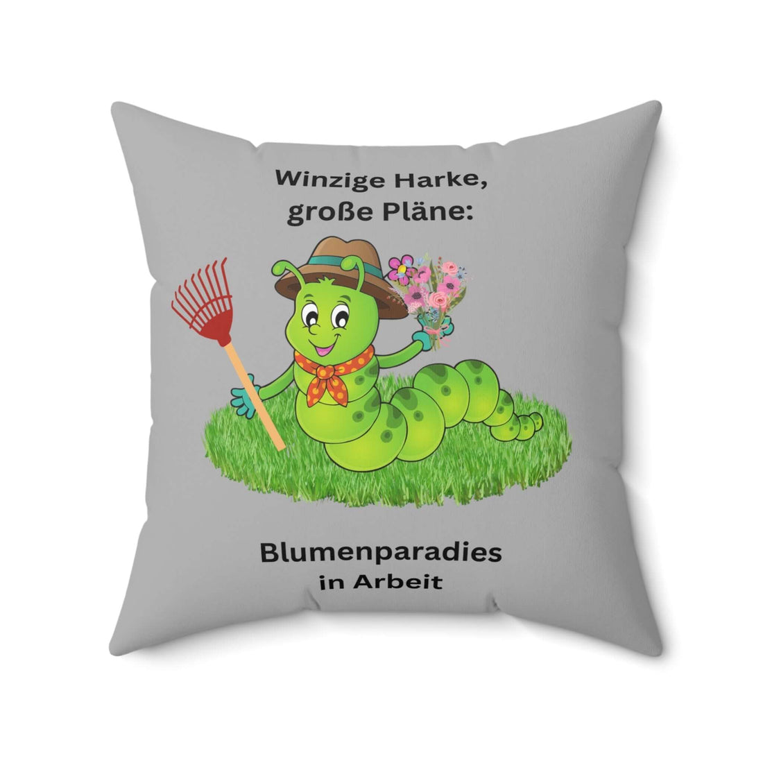 Skurriles Raupenkissen für Pflanzenliebhaber, quadratisches Kissen mit Cartoon-Raupe auf grauem Hintergrund, ideal für Gartenfreunde.